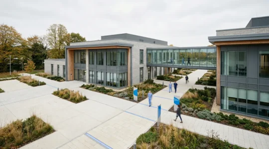 Aerial view of modern primary care medical center with connecting pathways symbolizing practice integration and collaborative healthcare delivery