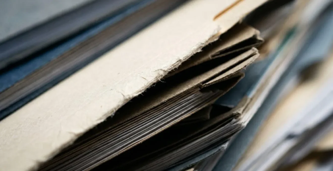 Abstract representation of concealed medical documentation through layered translucent surfaces and selective focus